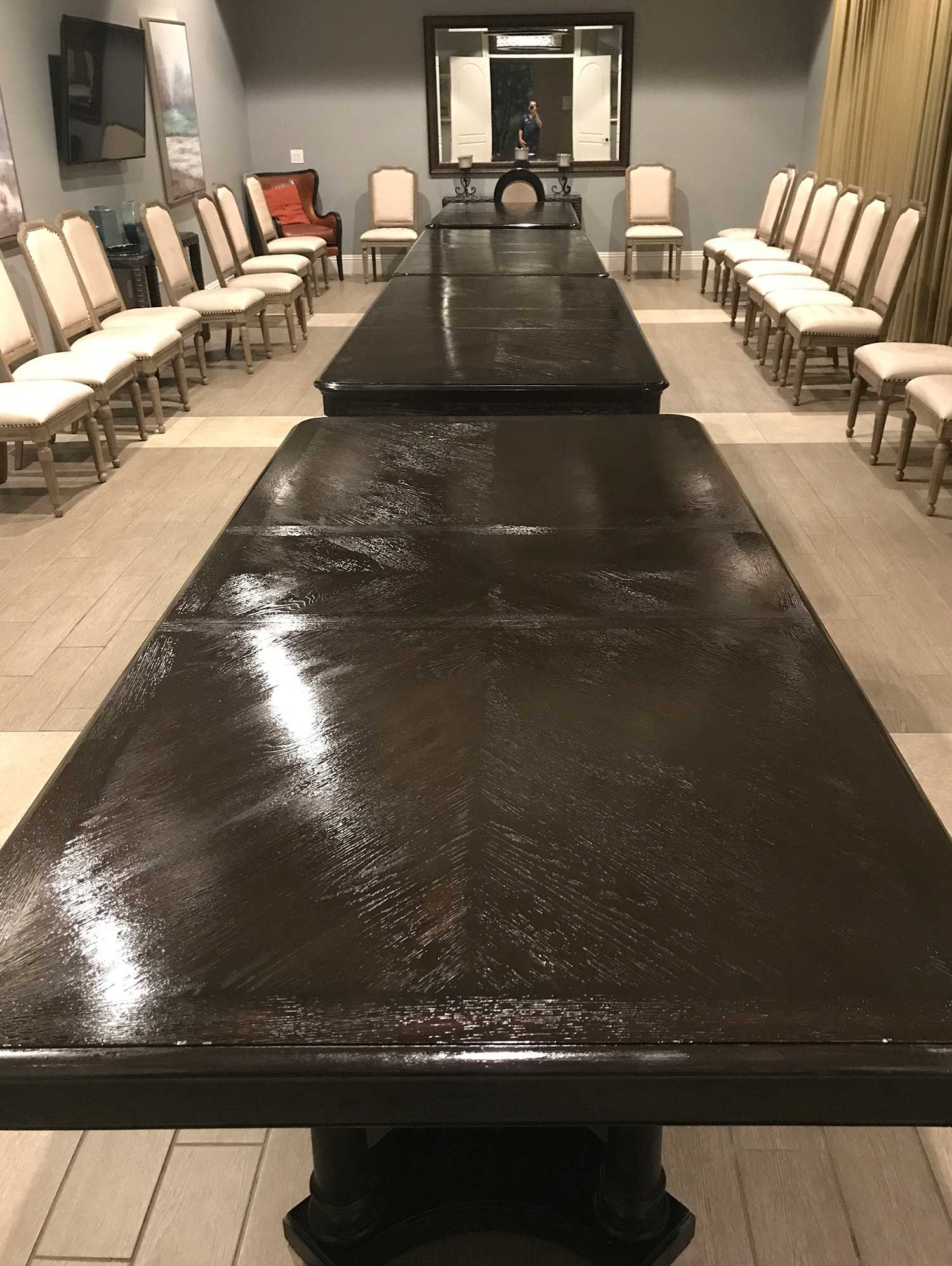 A Glossy high quality coffee table that has been restored to look brand new