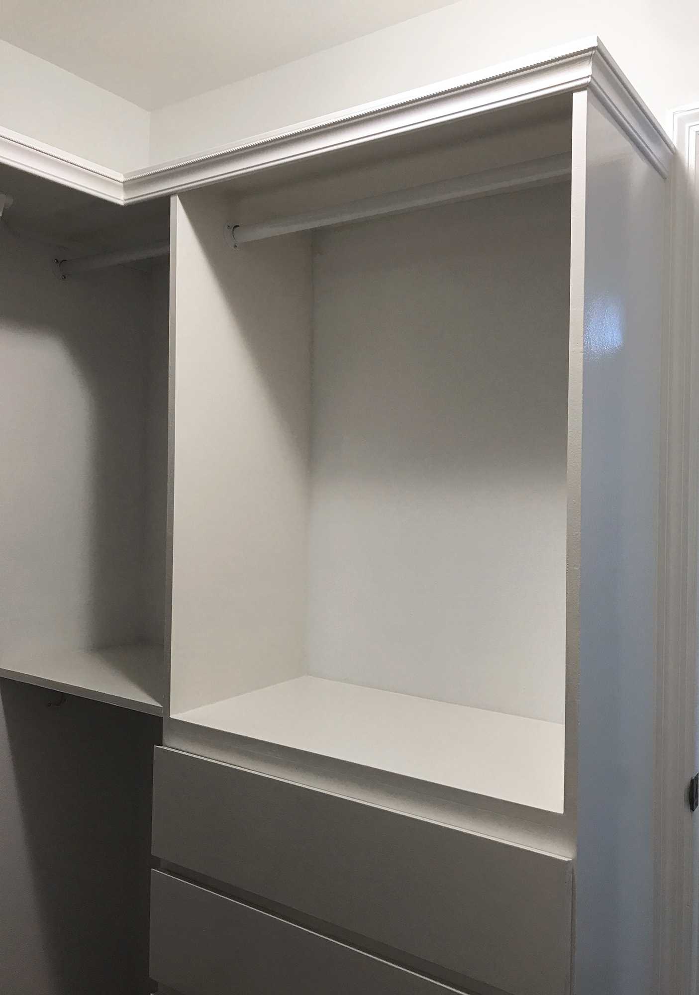 Newly renovated white walk-in closet